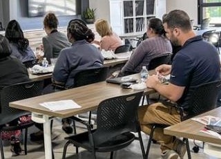 Participants attending a corporate training session